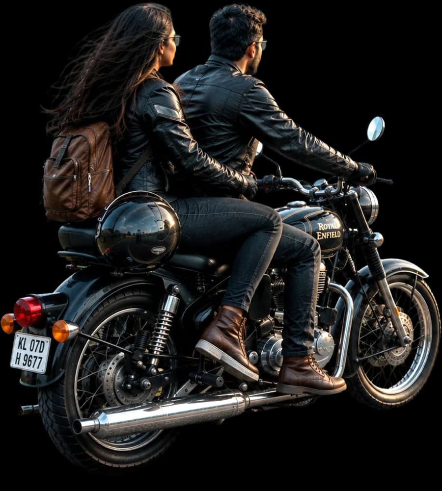 Two riders on a motorcycle looking out over the hills